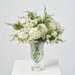 Lifelike White Snowball Blooms and Winter Juniper Berry Greenery Water Illusion Arrangement