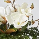 Close-up of vase silhouette detail on this Lifelike Cedar, Magnolia Leaf Bloom Water Illusion Arrangement
