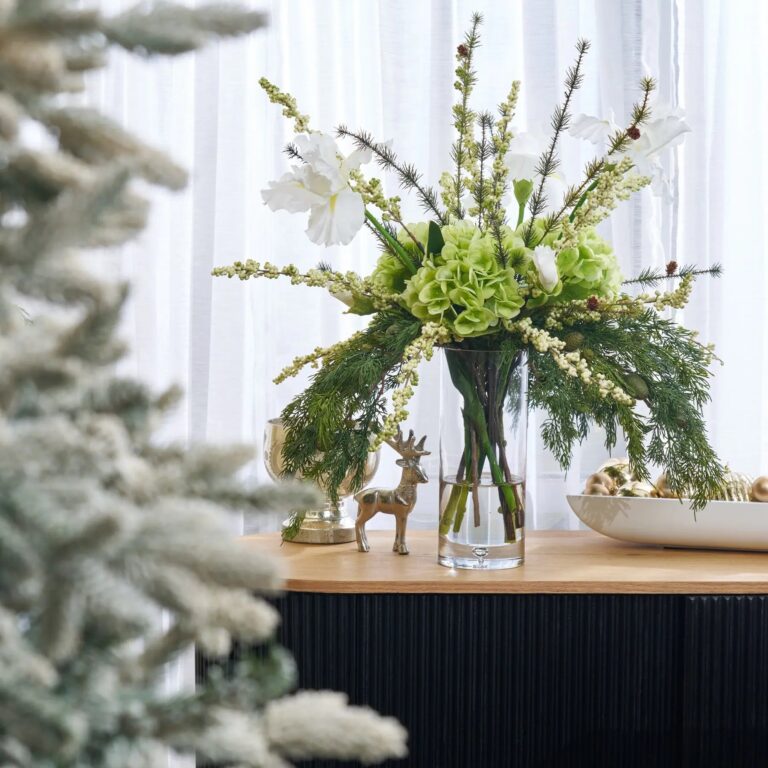 Close-up of vase silhouette detail on this Wintergreen Wonder - Real Touch Water Illusion Arrangement