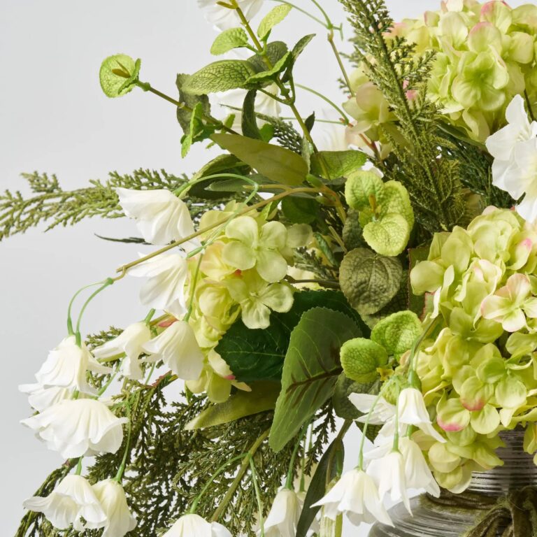 Close-up of vase silhouette detail on this Winter Tidings - Green Hydrangea, Water Illusion Arrangement