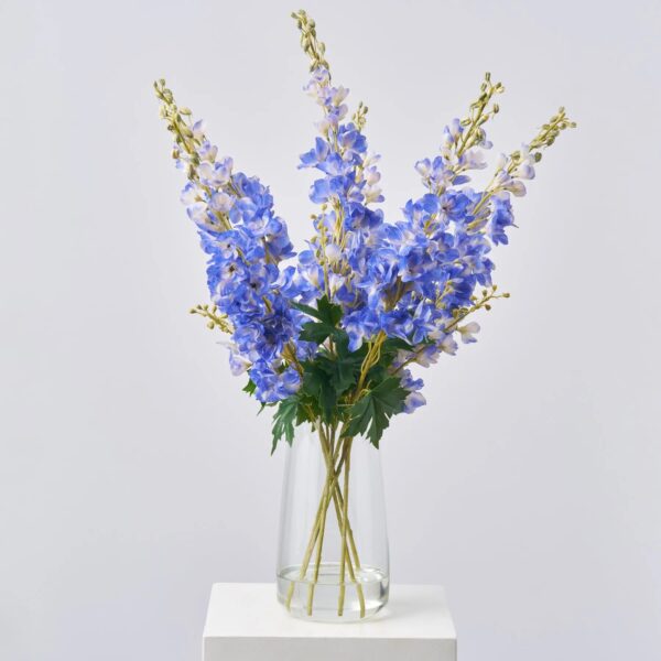 Large Blue Delphinium Flowering Blooms in Tall Teardrop Vase Spring Summer Water Illusion Arrangement Centerpiece