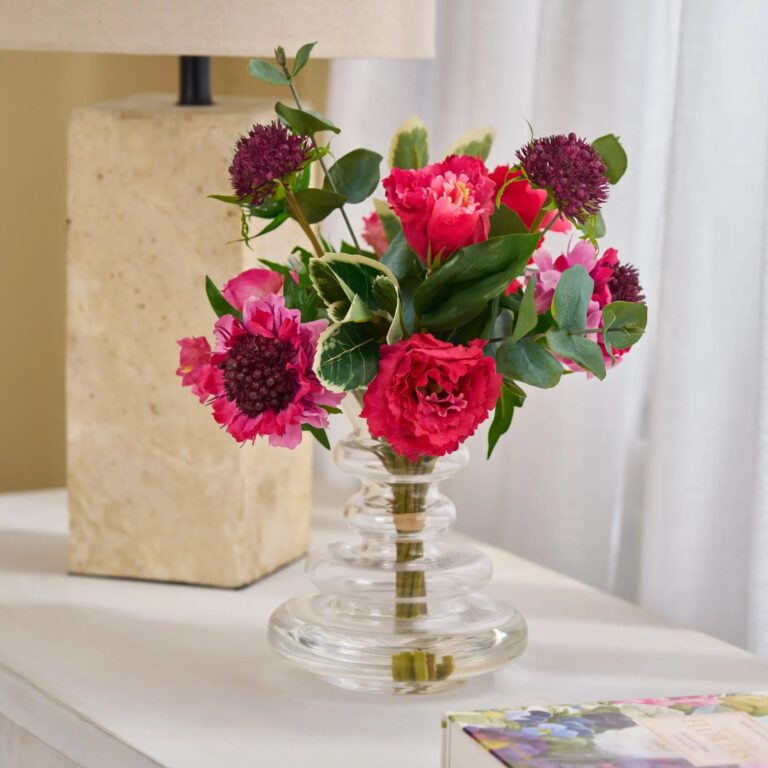 Close-up of vase silhouette detail on this Real Touch Pink Scabiosa Water Illusion Arrangement