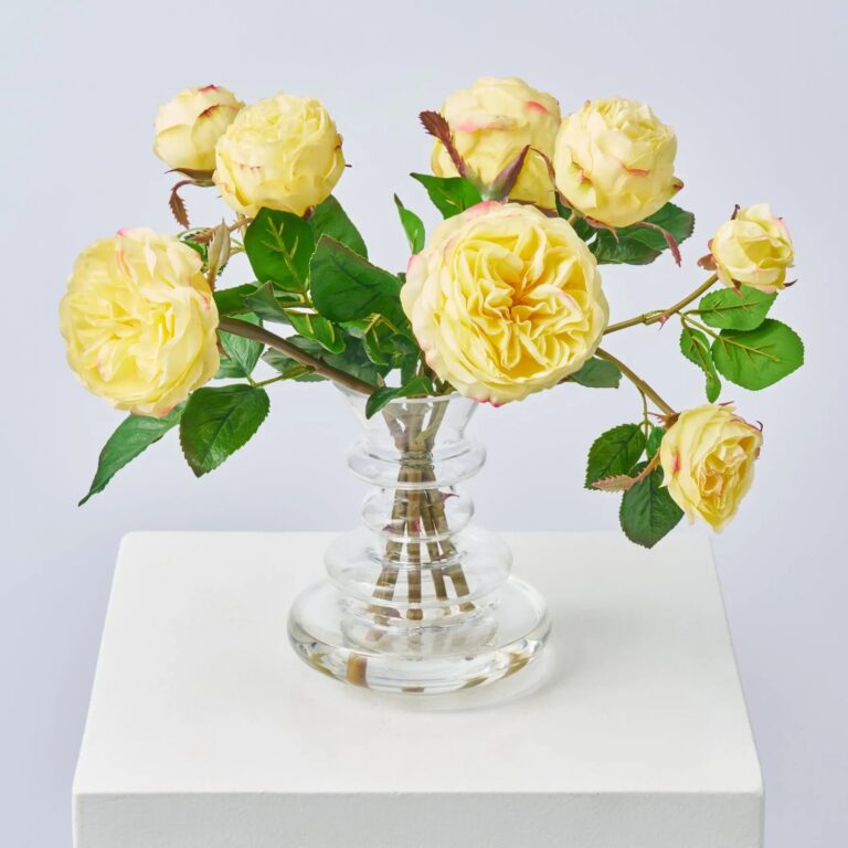 Close-up of vase silhouette detail on this Real Touch Yellow Floribunda Rose Layered Vase