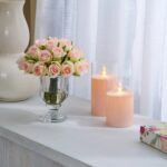 Alternate angle of the Lifelike Mini Blush Pink Juliette Mini Urn Vase showing bloom arrangement