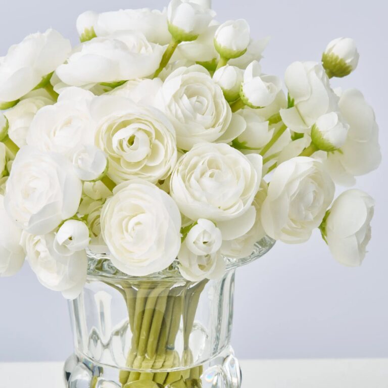 Close-up of vase silhouette detail on this Lifelike Mini White Ranunculus Blooms Water Illusion Arrangement