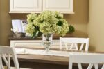 Alternate angle of the Realistic Limelight Green Hydrangea Blooms Large Urn Vase showing bloom arrangement