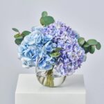 Close-up of vase silhouette detail on this Summer Hydrangea - Mixed Blue Water Illusion Arrangement