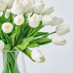 Close-up of vase silhouette detail on this Lifelike Real Touch White Mini Water Illusion Arrangement