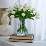 Alternate angle of the Lifelike Real Touch White Mini Water Illusion Arrangement showing bloom arrangement