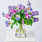 Lifelike Mixed Purple Pansy Blooms in Pyramid Vase Spring Faux Floral Water Illusion Arrangement