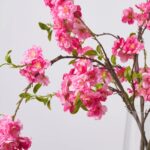 Close-up of vase silhouette detail on this Realistic Pink Cherry Blossom Blooming Spring Table Arrangement