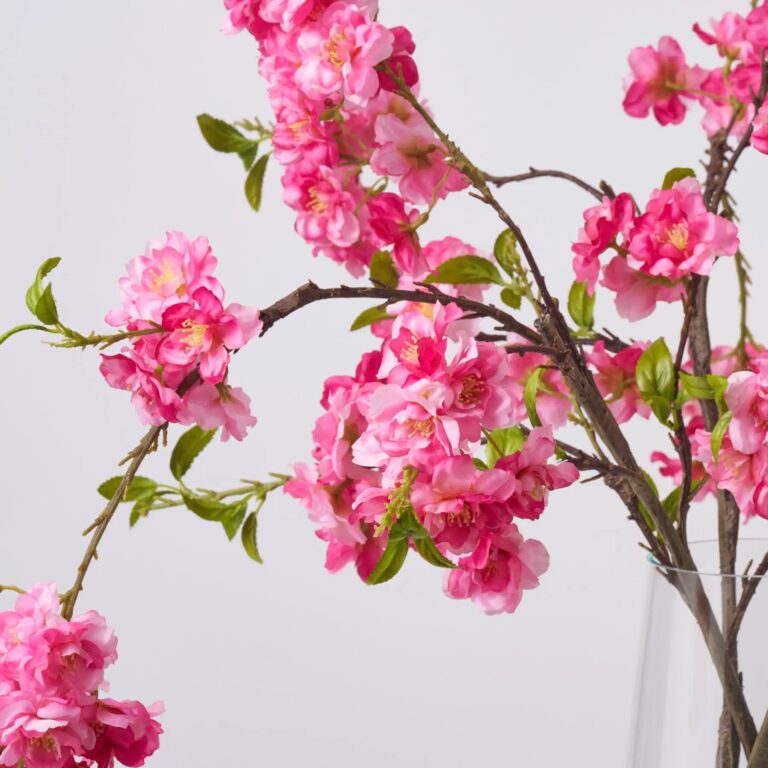 Close-up of vase silhouette detail on this Realistic Pink Cherry Blossom Blooming Spring Table Arrangement