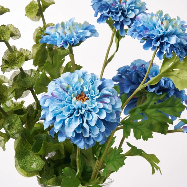 Close-up of vase silhouette detail on this Lifelike Blue Ombre Zinnia Blooms Water Illusion Arrangement