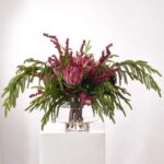 The Winter Majesty - Burgundy King Illusion Centerpiece Arrangement shown in full, highlighting vase silhouette