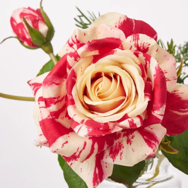 Close-up of vase silhouette detail on this Real Touch Candy Cane Juliette Water Illusion Arrangement