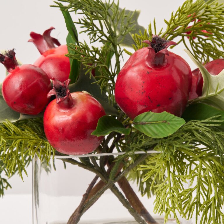 Close-up of vase silhouette detail on this Holiday Pomegranate and Holly Berry Oval Pocket Vase