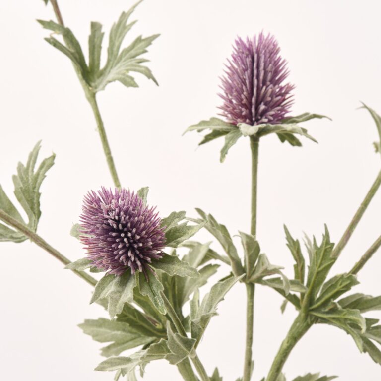 Close-up of vase silhouette detail on this Lavender Wild Faux Thistle Spray Water Illusion Arrangement