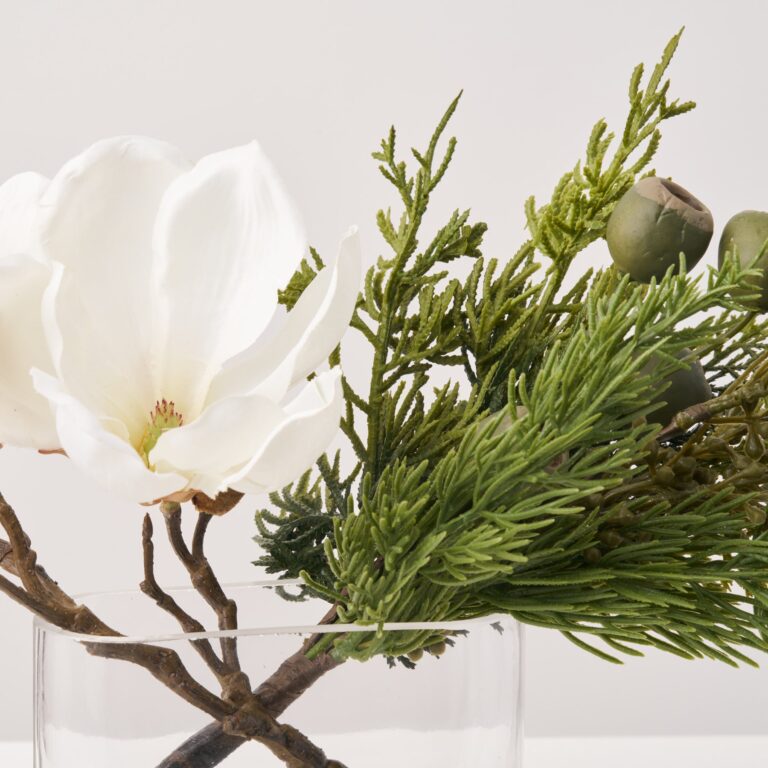Close-up of vase silhouette detail on this White Magnolia Bloom and Bud Modern Oval Vase