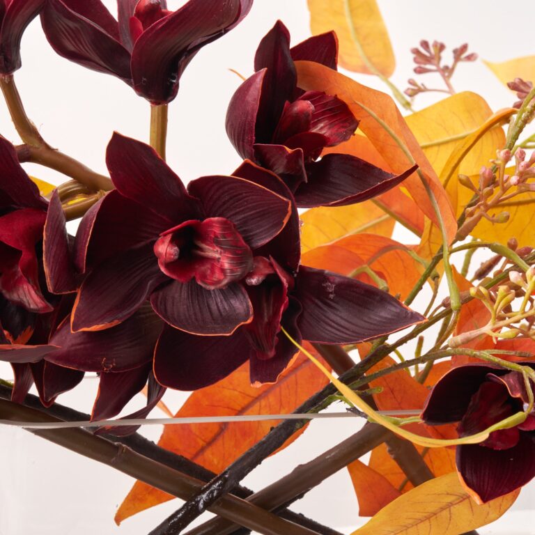 Close-up of vase silhouette detail on this Orchid Sunset - Burgundy Orange Oval Pocket Vase