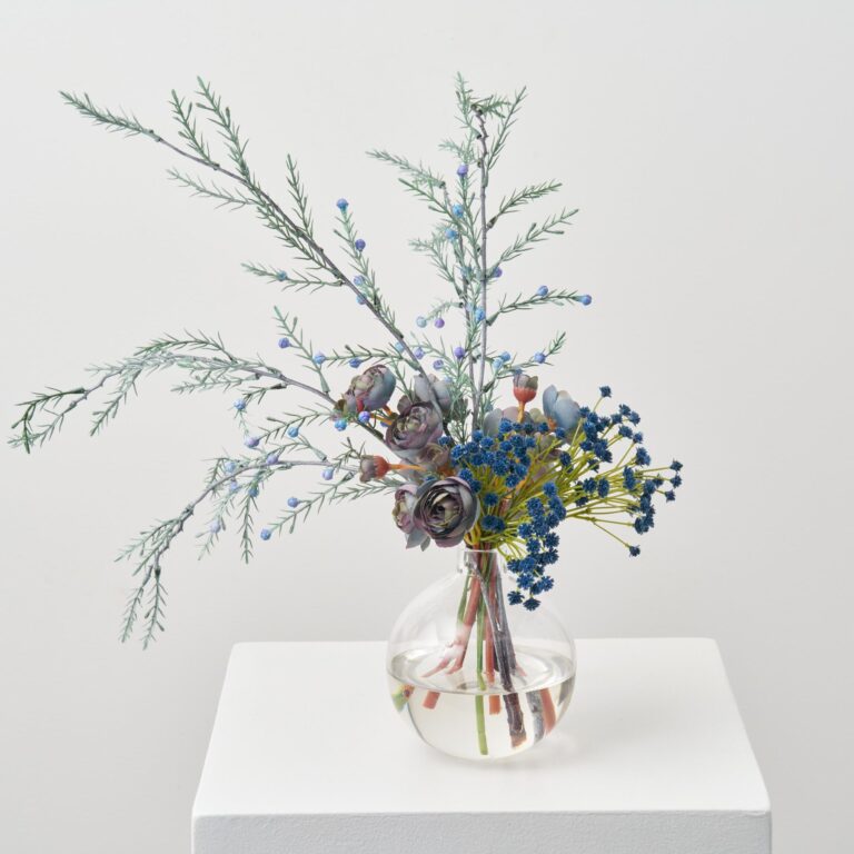Close-up of vase silhouette detail on this Something Blue Bouquet - Dusty Water Illusion Arrangement