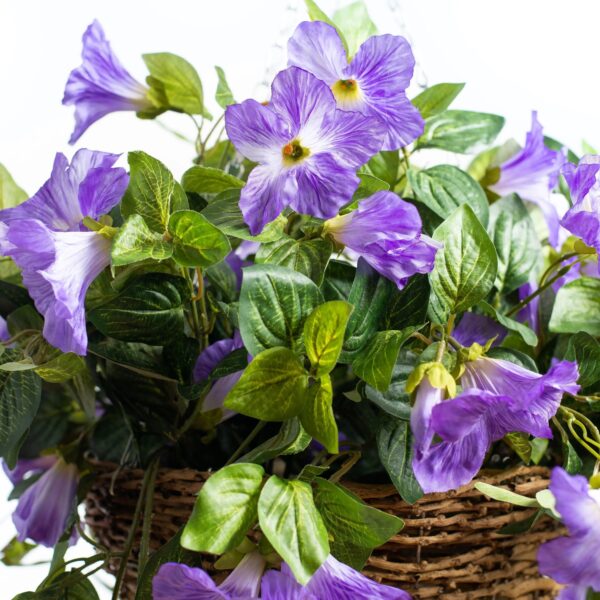 Close-up of leaf foliage texture on this Cascading Purple Petunia Artificial Plant Rattan Hanging Basket