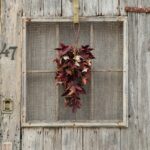Alternate angle of the Maroon Maple Leaf Teardrop Fall Single Swag showing full swag shape