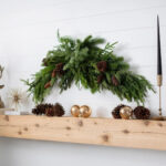 Close-up of swag tail detail on this Real Touch Norfolk, Spruce Holiday Table Swag