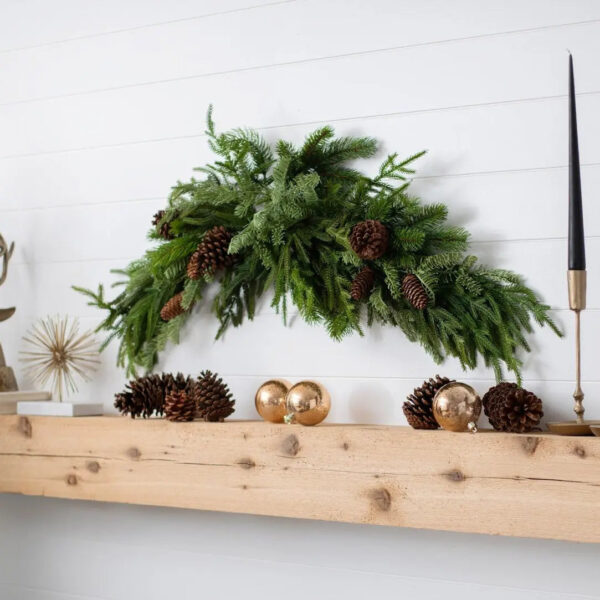 Close-up of swag tail detail on this Real Touch Norfolk, Spruce Holiday Table Swag