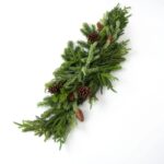Alternate angle of the Real Touch Norfolk, Spruce Holiday Table Swag showing full swag shape