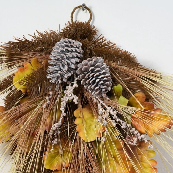 Close-up of swag tail detail on this Bleached Wheat Grass, Pinecone Front Door Swag