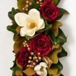 Close-up of swag tail detail on this Magnolia Majesty - Real Touch Hanging Christmas Swag