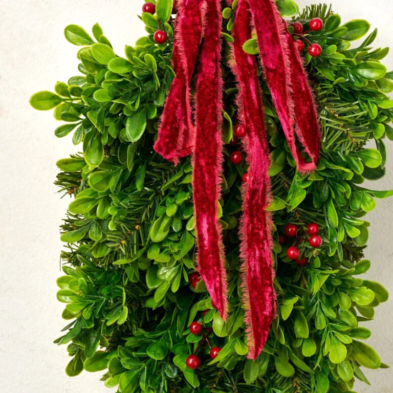 Close-up of swag tail detail on this Christmas Berry and Boxwood Hanging Velvet Silk Ribbon