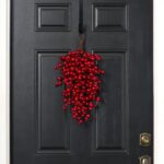 Alternate angle of the Mixed Red Berry Waterproof Winter Door Hanging Swag showing full swag