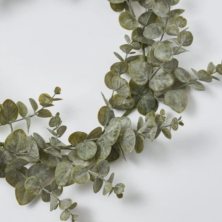 Close-up of greenery along the garland on this Sage Green Eucalyptus All Season Season Greenery