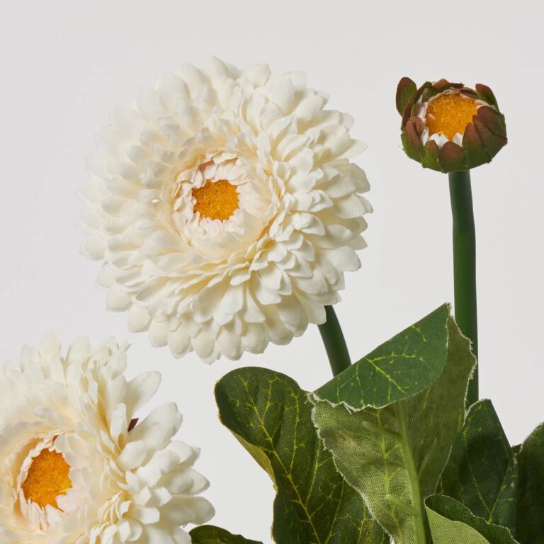 Close-up of bloom tips on this White Silk English Daisy Bush Foliage Stem Bouquet