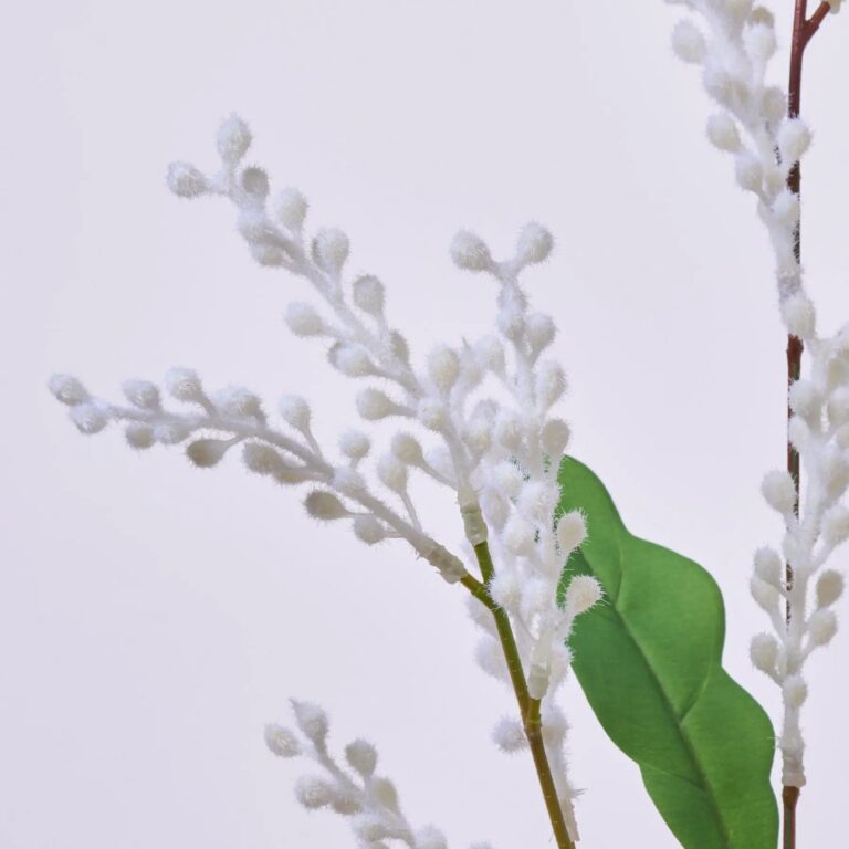 Close-up of bloom tips on this Fuzzy White Flocked Mimosa Branch Faux Floral Spray