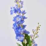 Alternate angle of the Blooming Blue Real Touch Delphinium Spray Long Stem showing leaves along