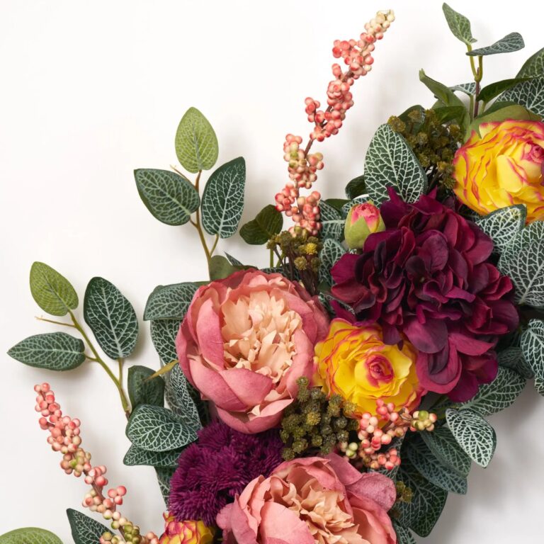 Close-up of blooms and berries on this Fall Sangria - Yellow Ranunculus, Front Door Wreath