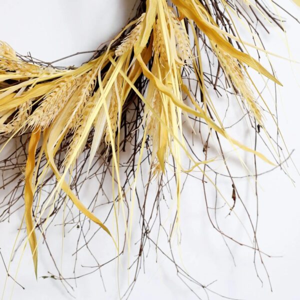 Close-up of blooms and berries on this Fall Wheat and Wispy Birch Front Door Wreath