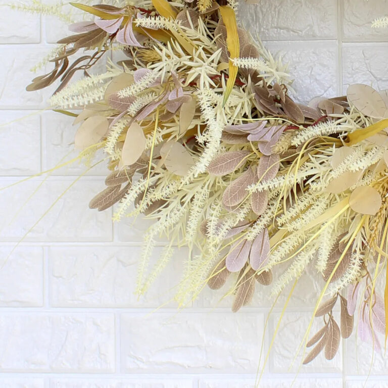 Close-up of blooms and berries on this Cream Astilbe, Yellow Wheat Grass Door Fall Wreath