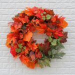 Detail view of layered greenery detail from the Orange and Green Ombre Maple Fall 28'