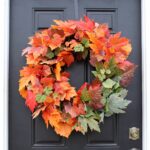 Alternate angle of the Orange and Green Ombre Maple Fall 28' Wreath showing wreath face