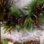 Close-up detail capturing ribbon and accent detail of the Northern Elk Faux Antler Door Holiday