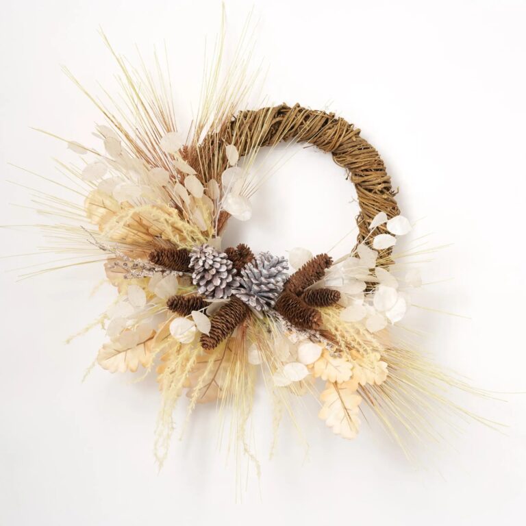 Close-up of blooms and berries on this Cashmere and Pinecones - Bleached Front Door Wreath