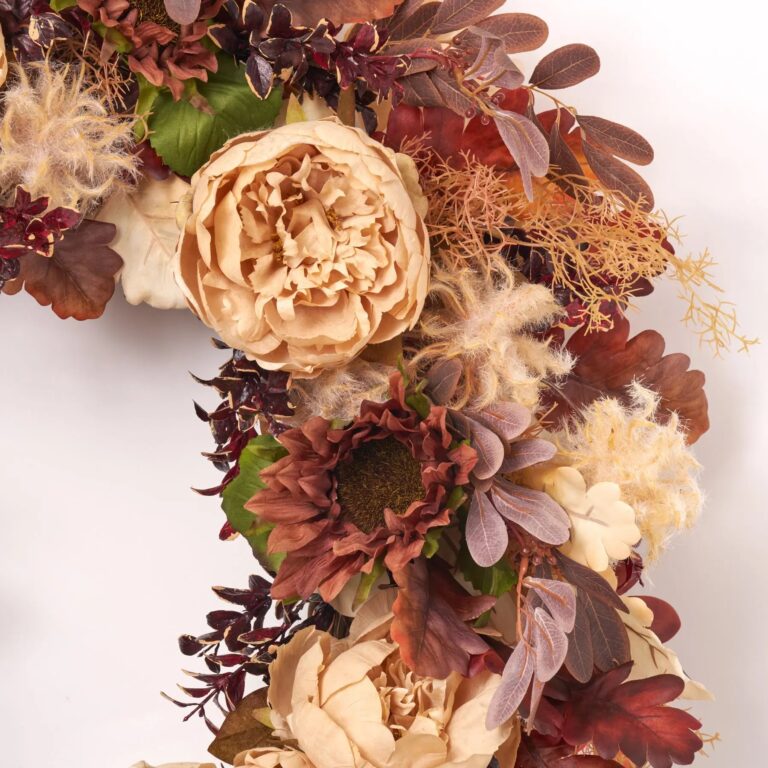 Close-up of blooms and berries on this Cashmere Radiance - Cafe au Front Door Wreath