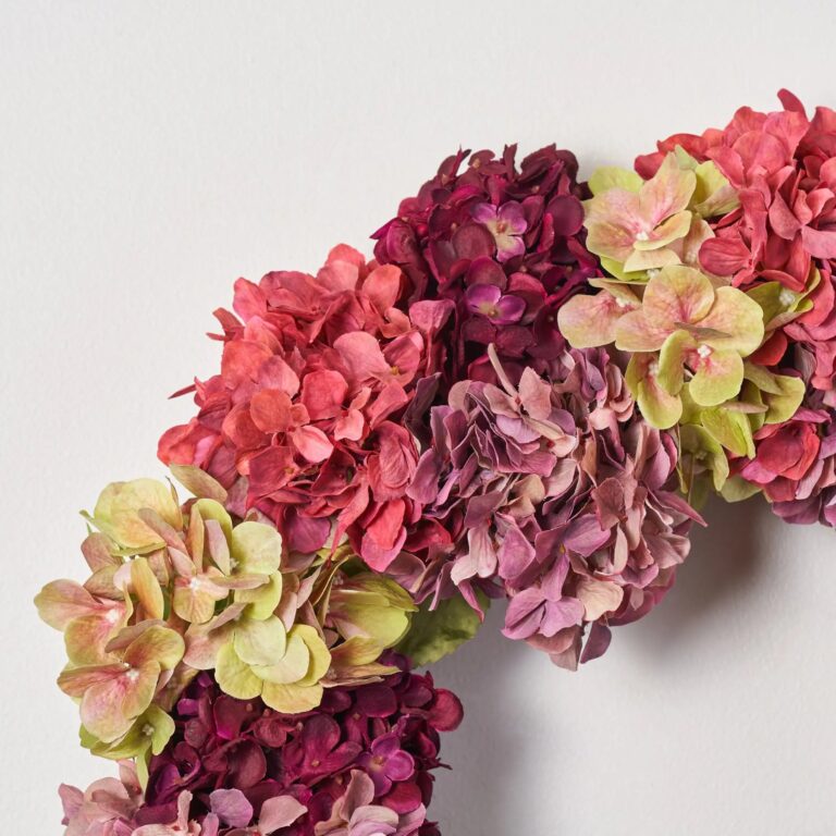 Close-up of blooms and berries on this Fall Watercolors - Mixed Wine Door Mantel Wreath