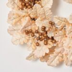 Alternate angle of the Bleached Cream Oak Leaf Berry Fall Wreath showing wreath face texture