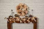 Detail view of layered greenery detail from the Bleached Cream Oak Leaf Berry Fall Wreath