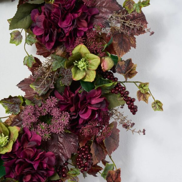 Close-up of blooms and berries on this Merlot Ivy Medley with Fall Front Door Wreath
