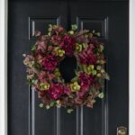 Alternate angle of the Merlot Ivy Medley with Fall Front Door Wreath showing wreath face